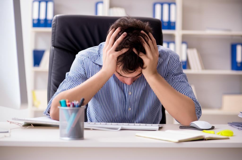 tired office worker yawning at desk